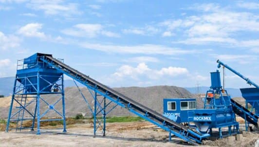 RWMM-200 load-out conveyor rising to the 25-ton storage silo at Vizag