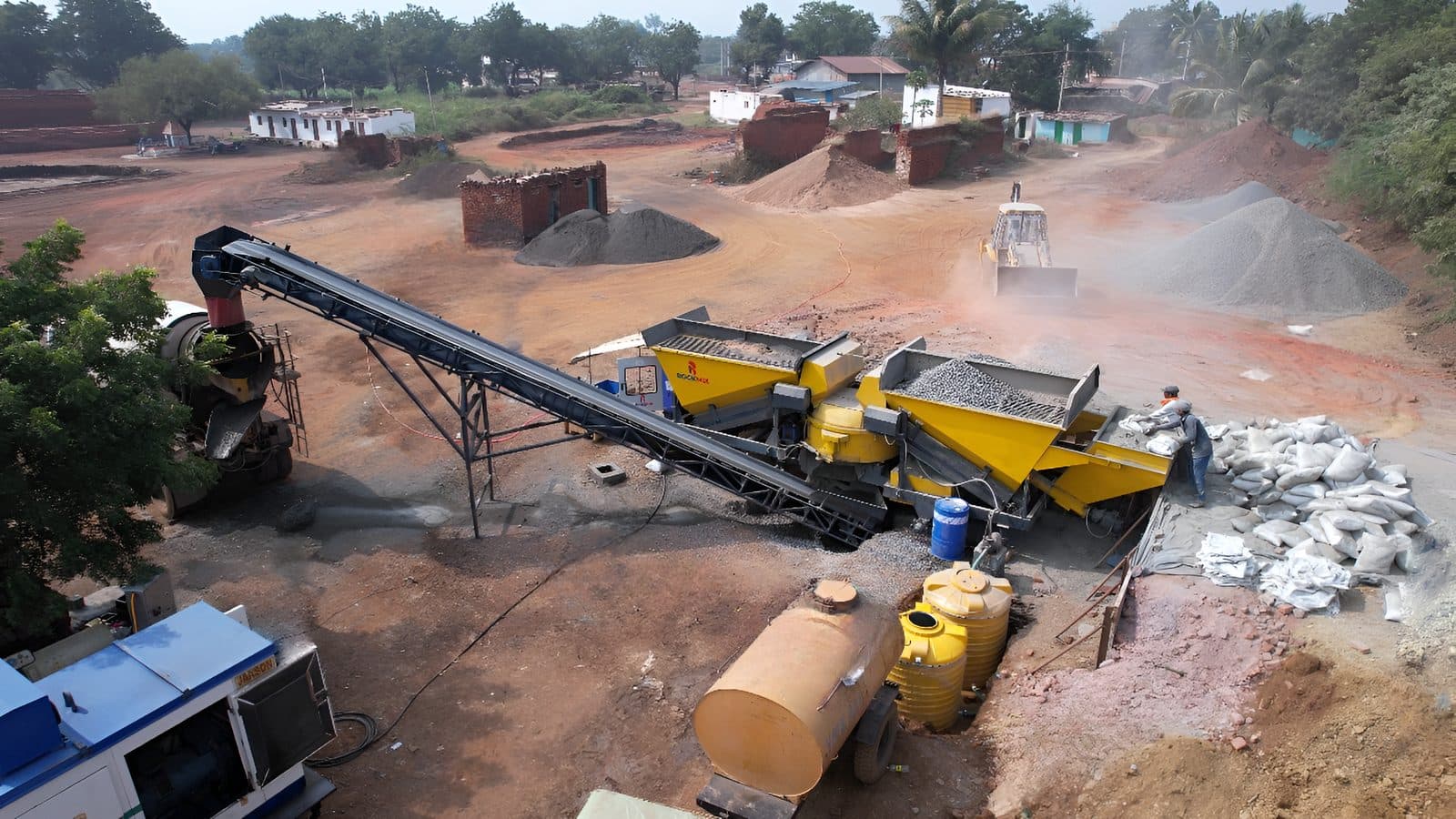 RMP mobile concrete batching plant working on site with a load-out conveyor