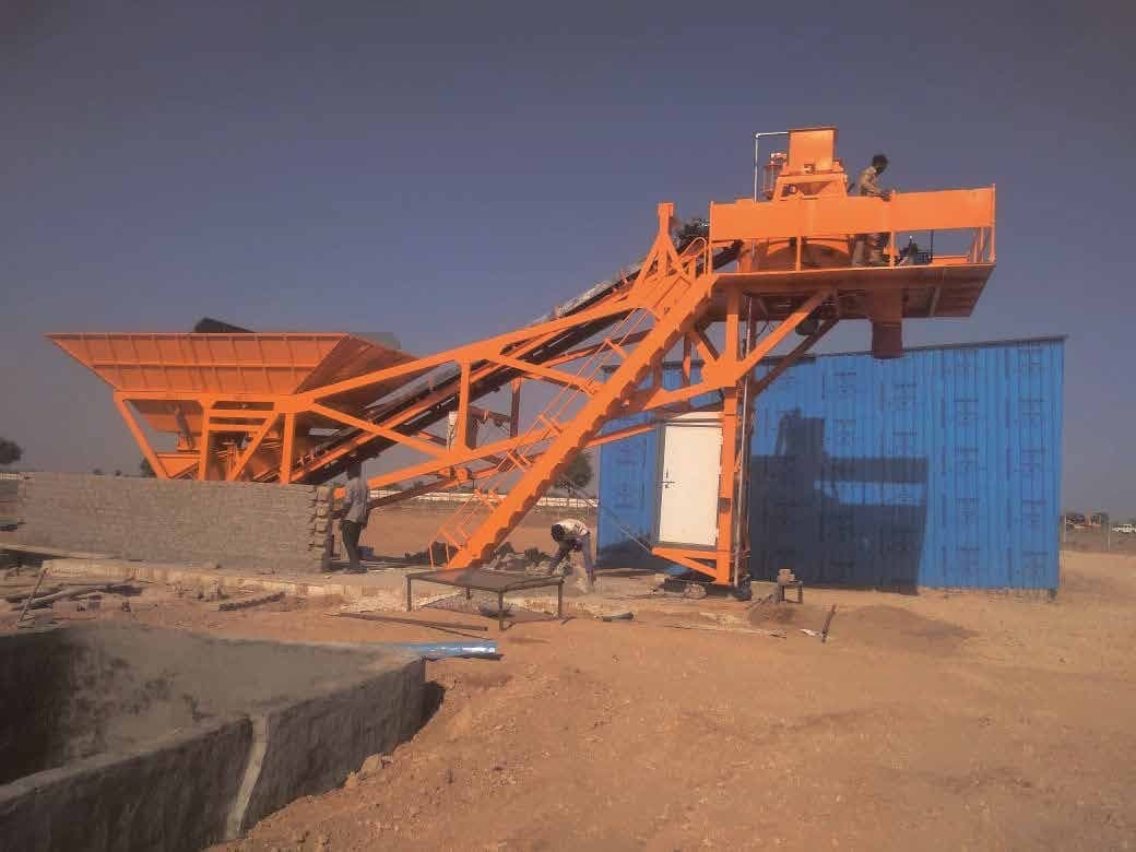 RCP compact plant on site with raised mixing platform and inclined conveyor